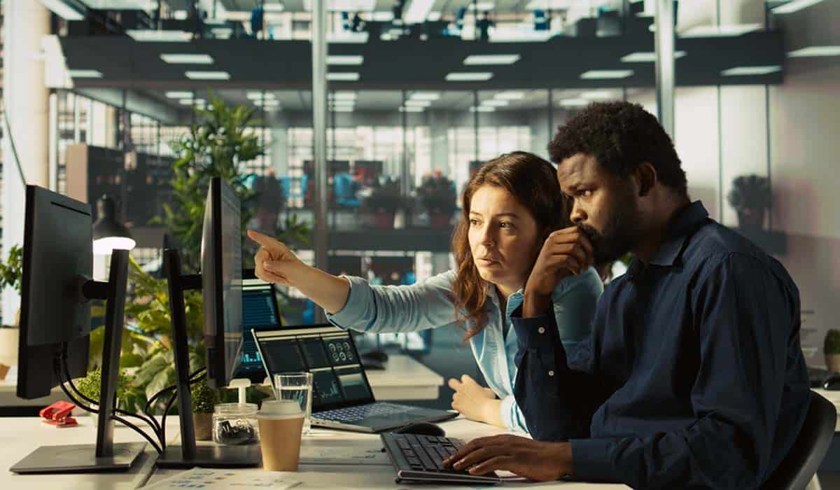 IT professionals collaborating in an office