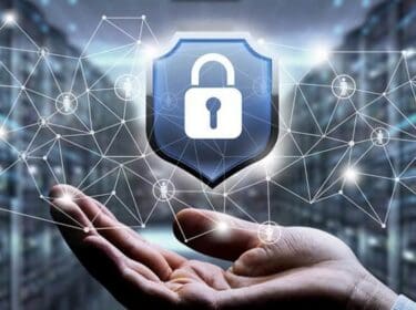 Digital shield and padlock illustrating cybersecurity, trusted systems and cyber resilience